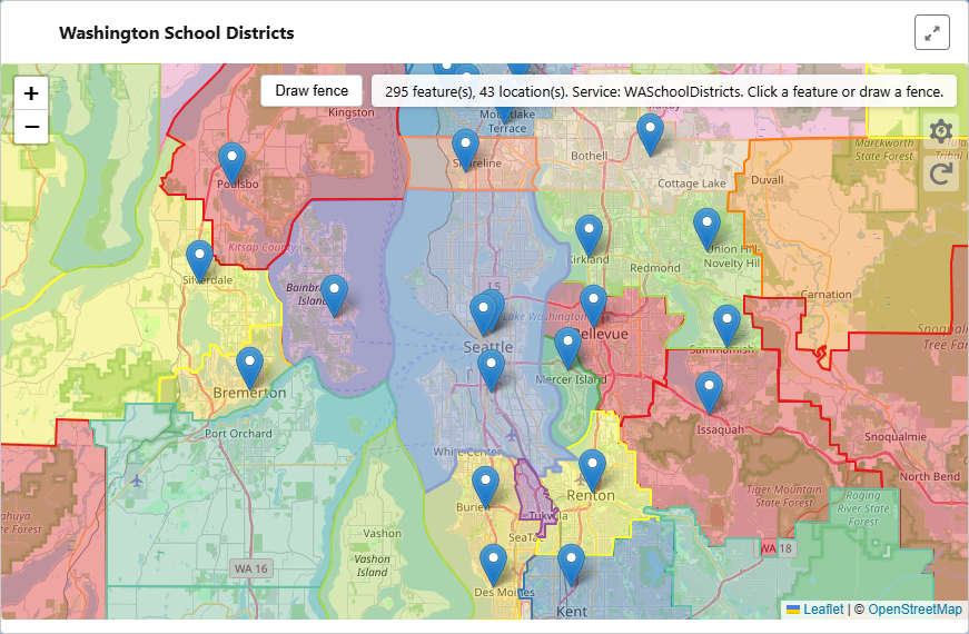 Report markers on a Washington school districts map with boundary overlays, draw fence, and status bar in the External Map with Report component.